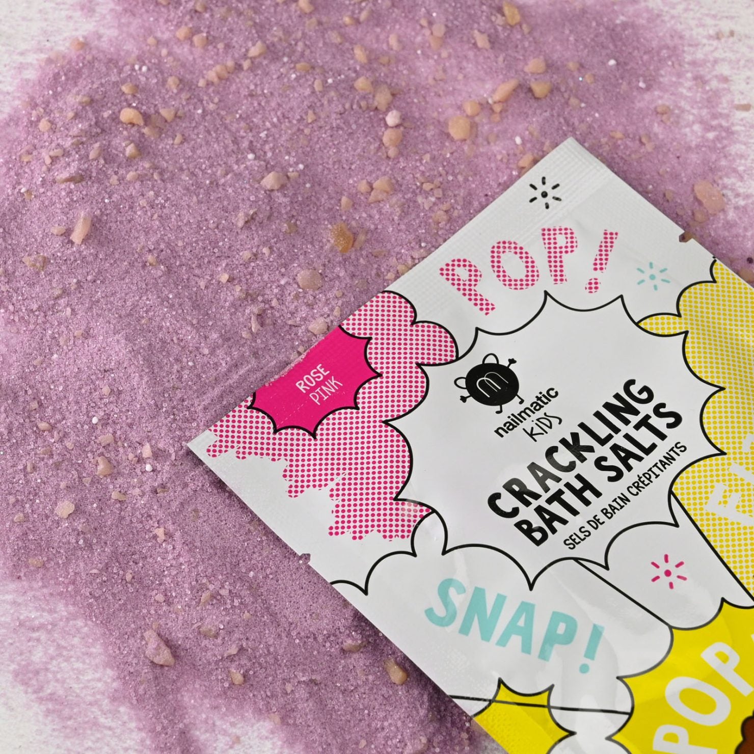 Pink colored crackling bath salts