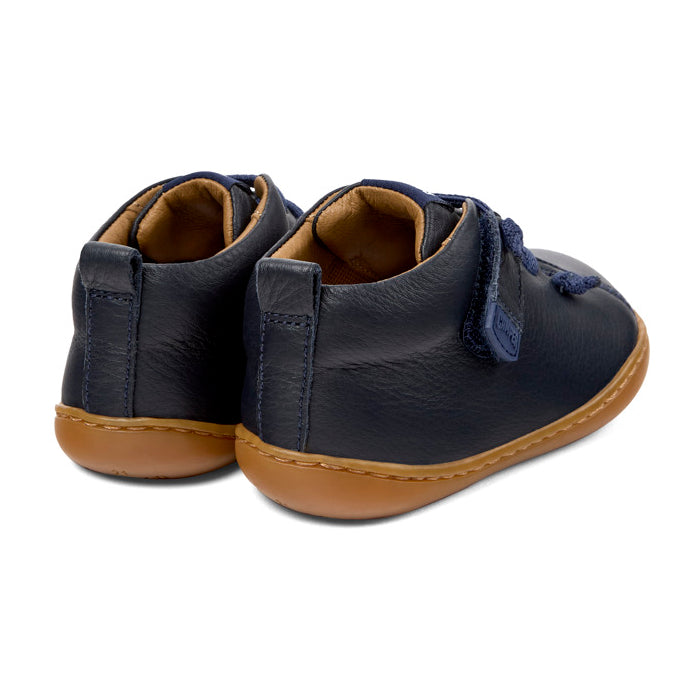 Stivaletti blu in pelle, Peu