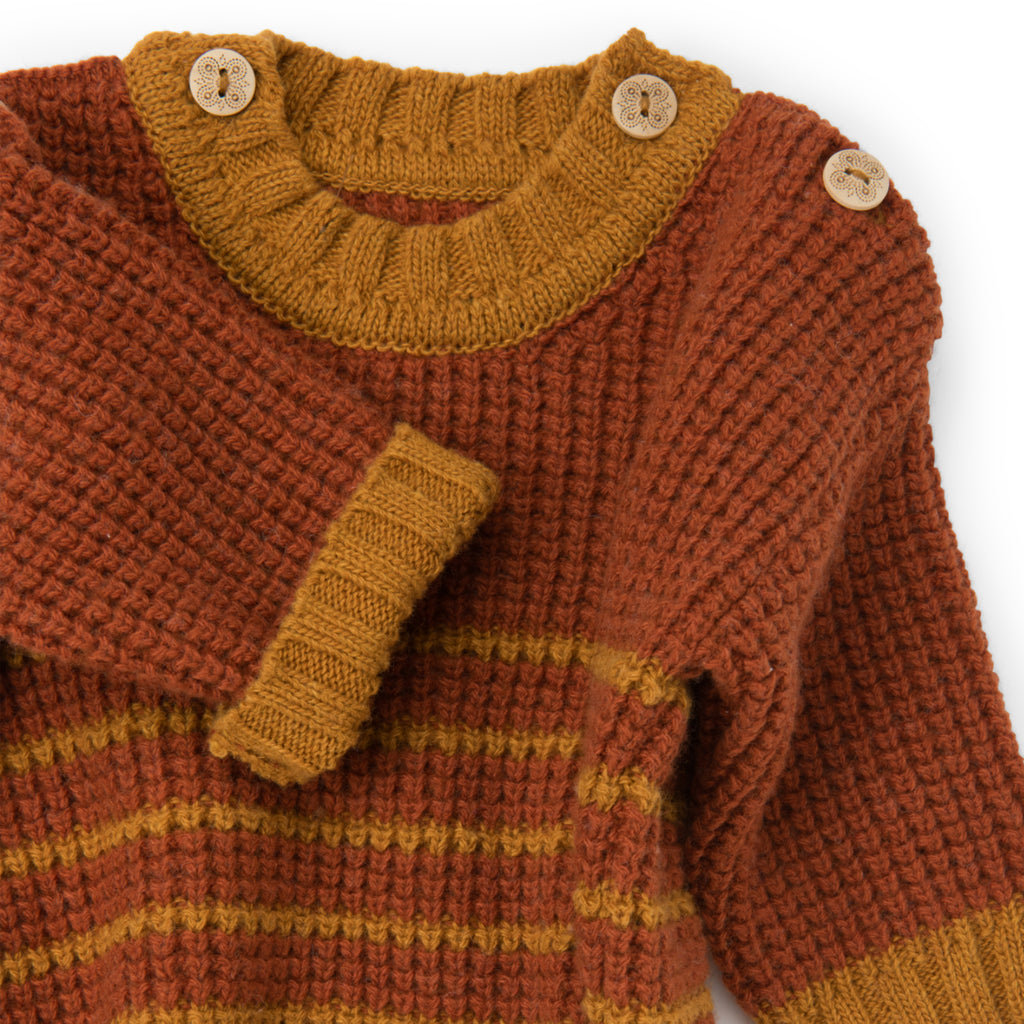 Maglione a righe mattone, Malvine