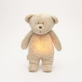 Moonie Humming bear in organic cotton with nightlight, Sand