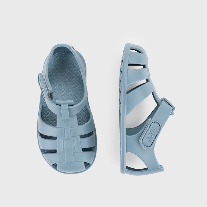 Beach sandals barefoot concept, ocean
