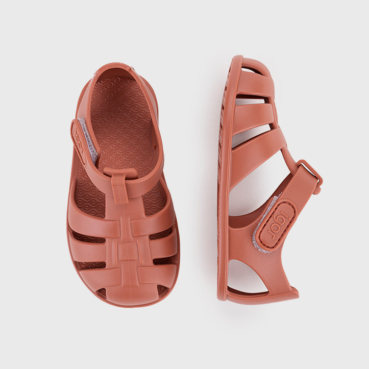 Beach sandals barefoot concept, Terracotta