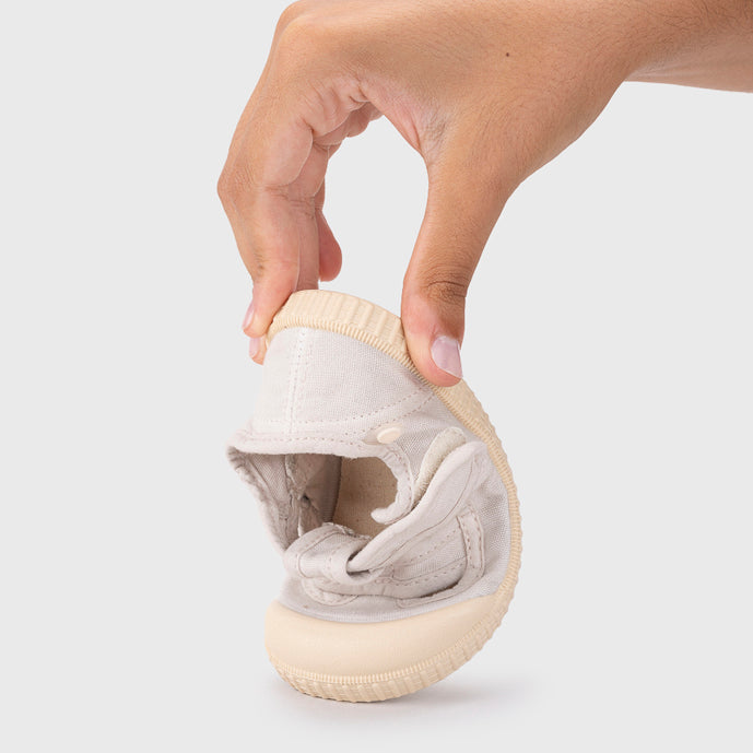 Open canvas shoes barefoot concept, Ice