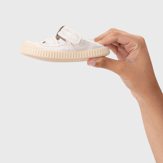 Open canvas shoes barefoot concept, Ice