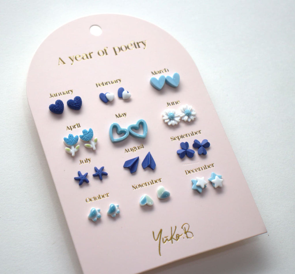 Set of 12 pairs of earrings, A year of poetry - Blue