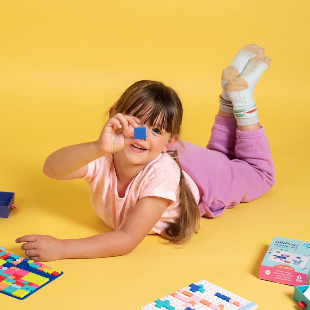 Creative pop-on mosaic game