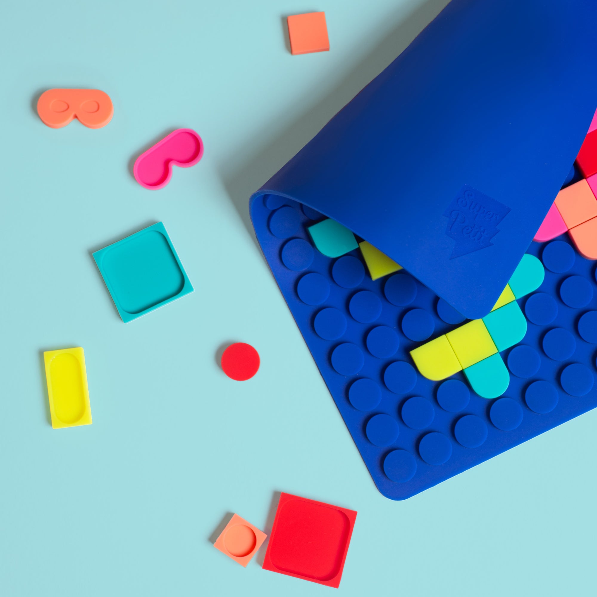 Creative pop-on mosaic game